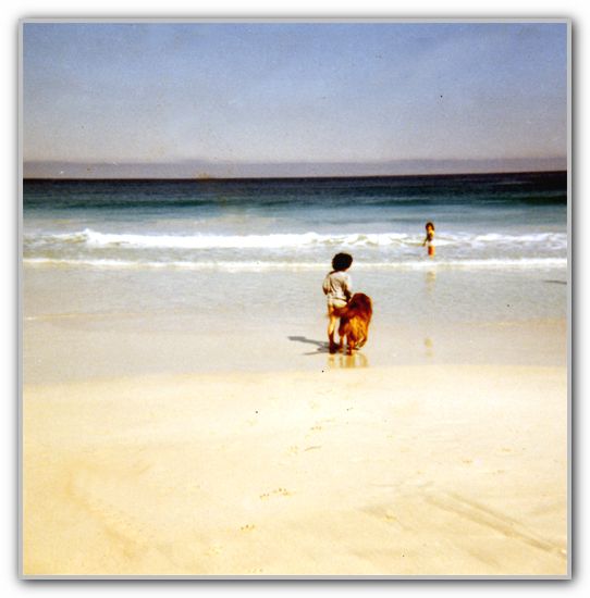 LJ at beach with Mrs Reeves Dog MJ is in background